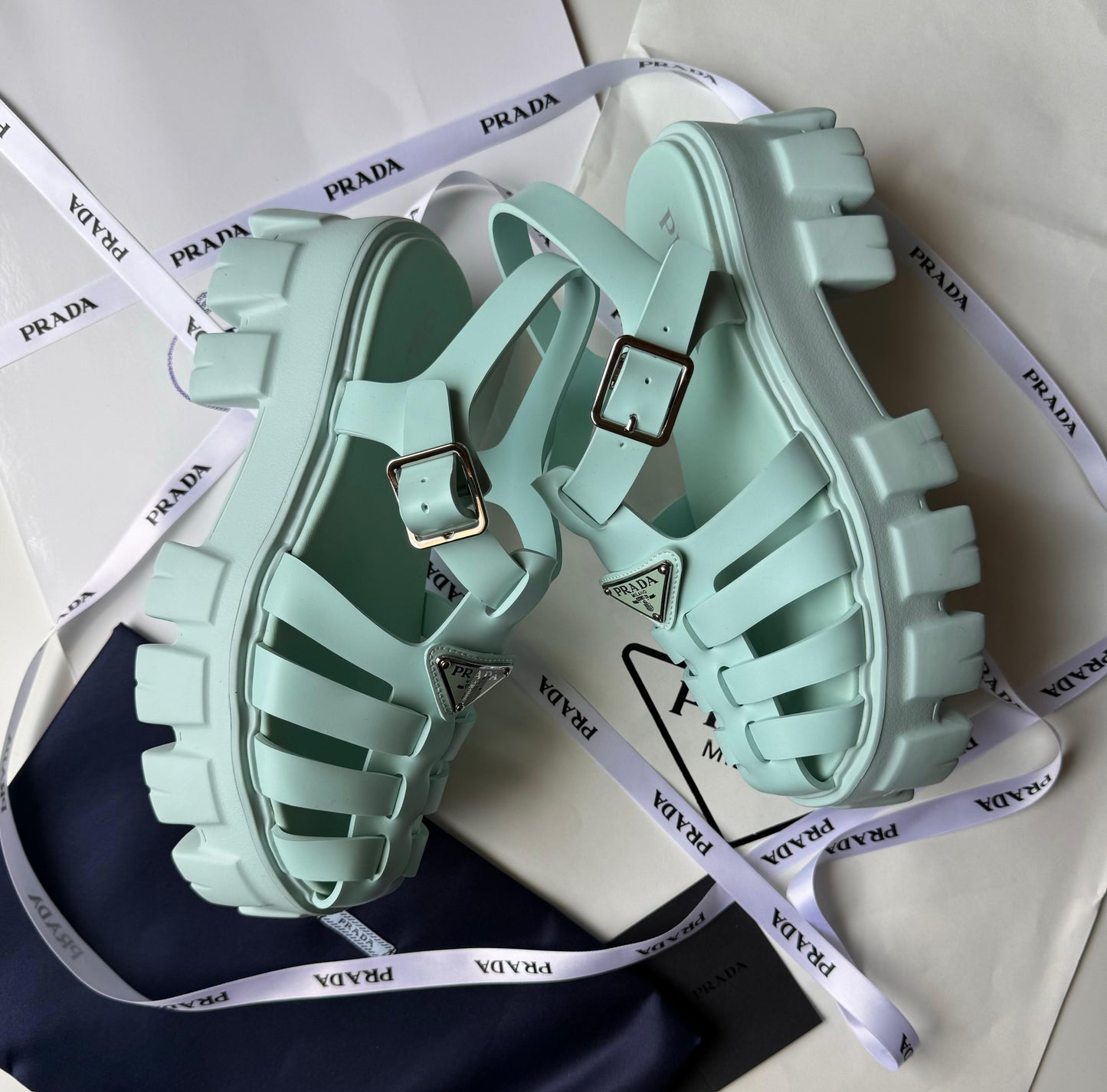 Prada sandals.