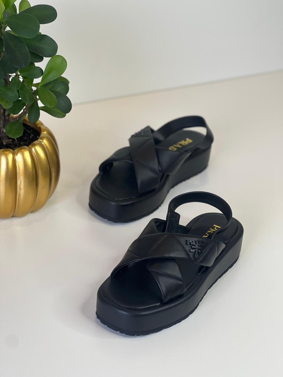 Prada sandals.