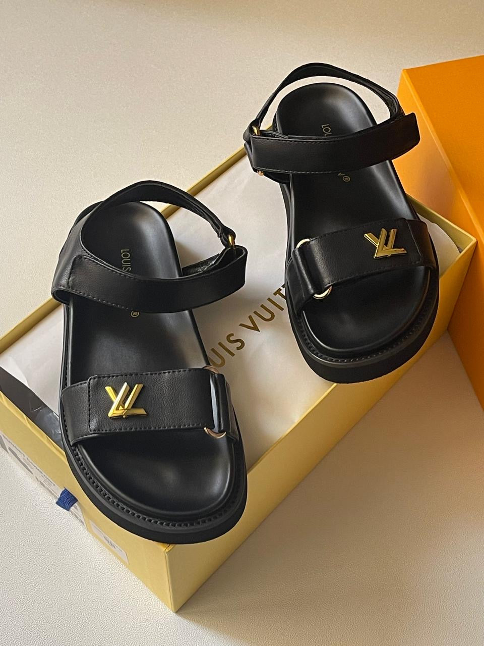 Lv sandals.