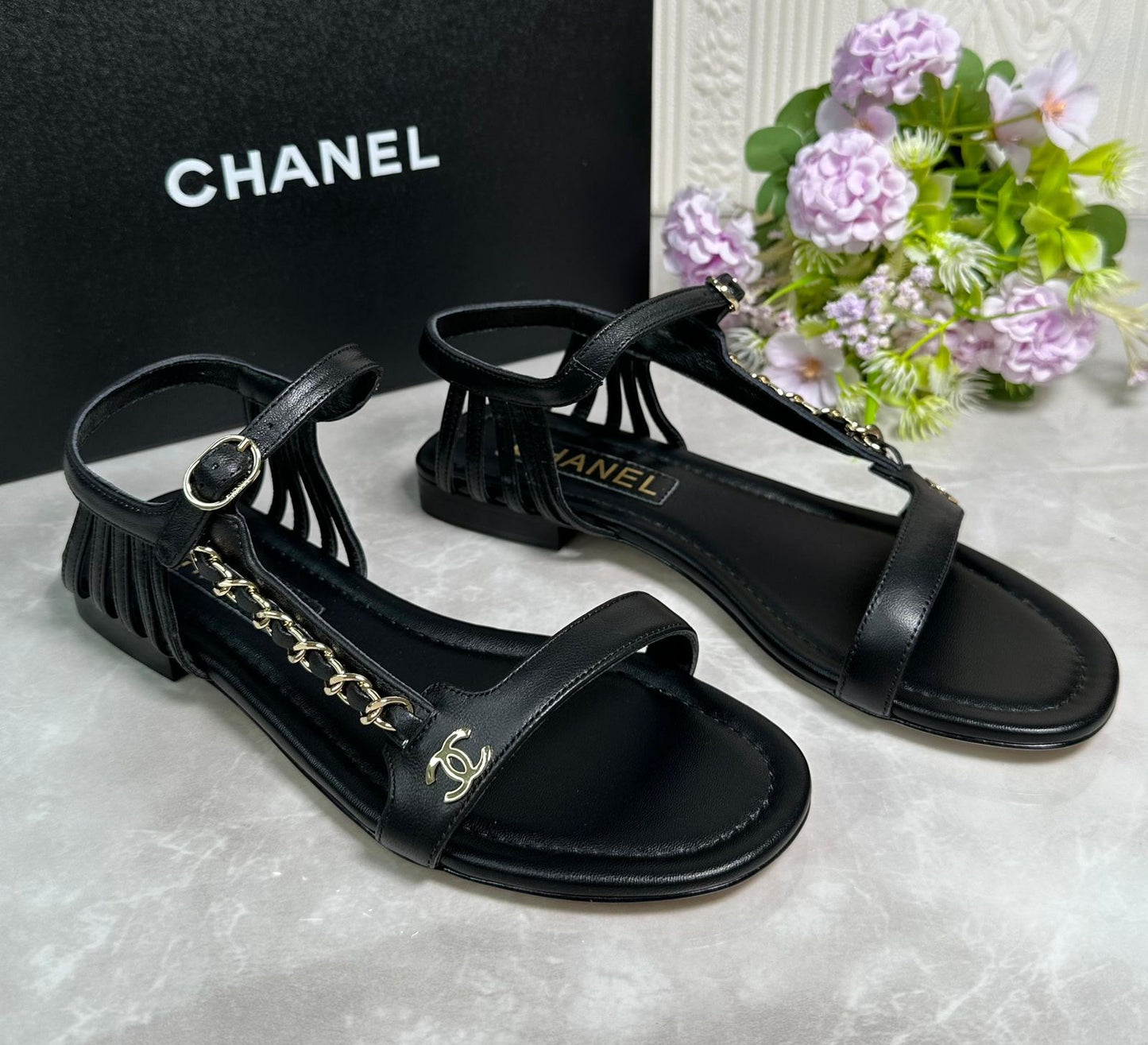 Chanel sandals.