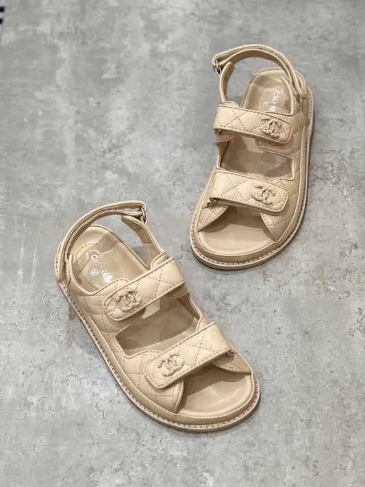 Chanel sandals.