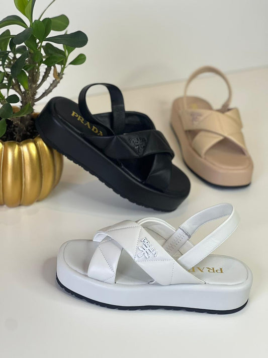 Prada sandals.