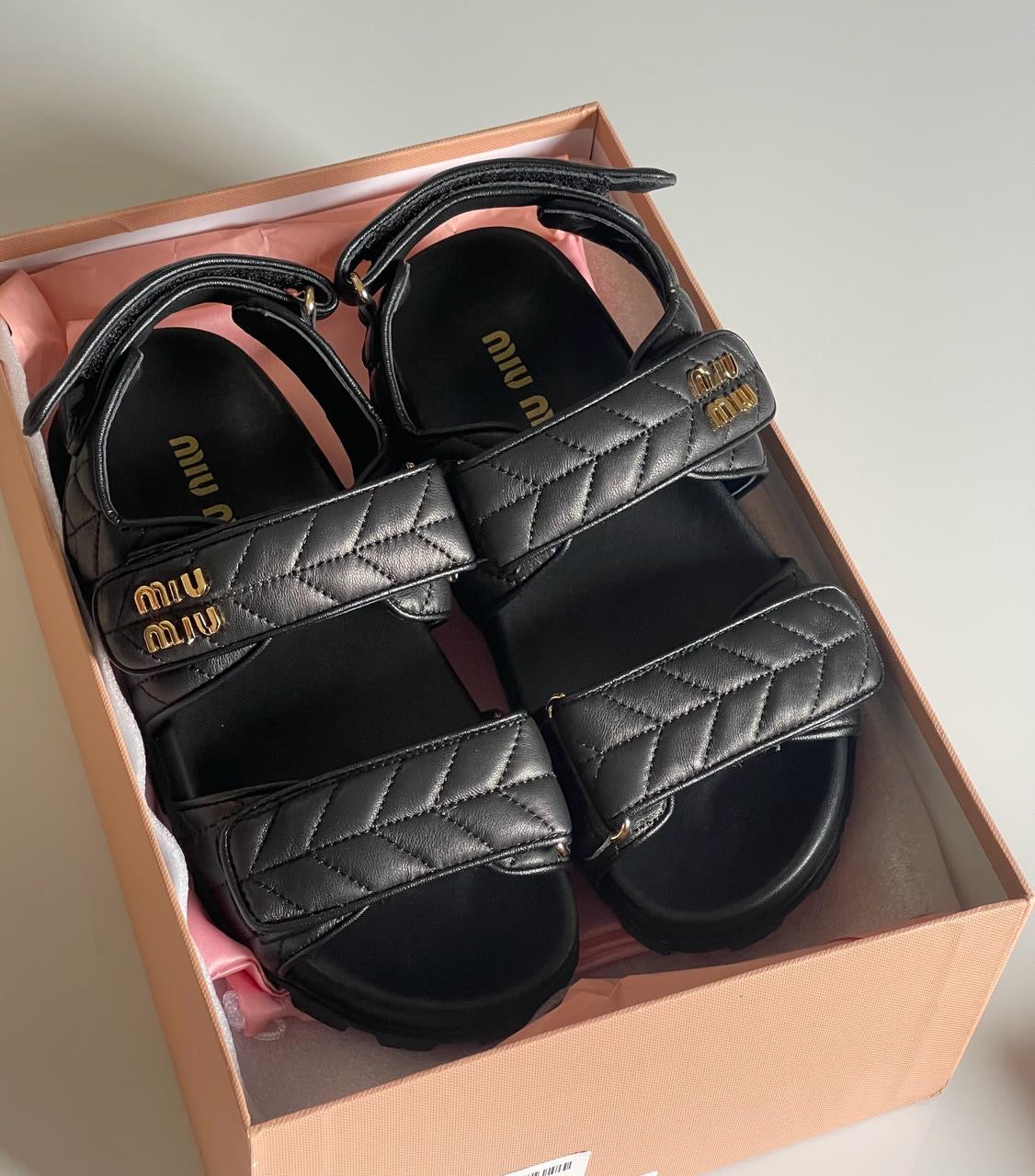 Miu miu sandals.