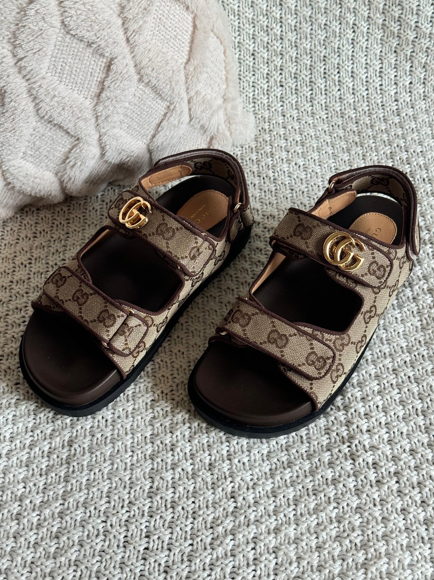 Gucci sandals.