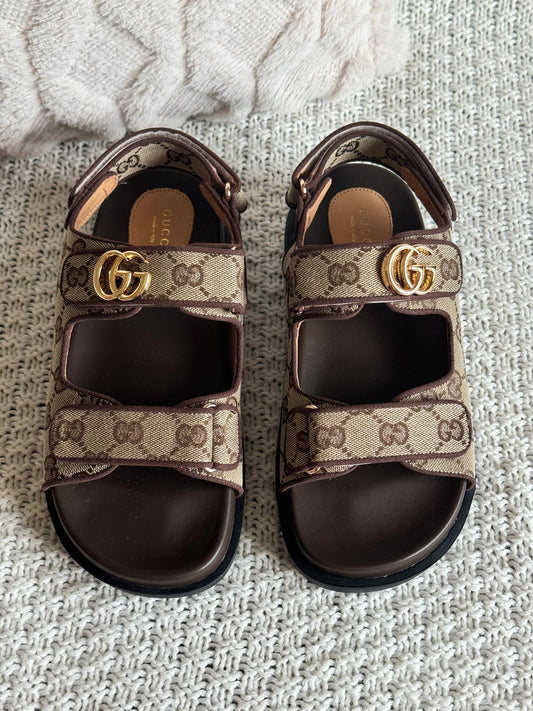 Gucci sandals.